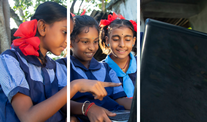 Three girl students are learning how to operate a laptop computer together